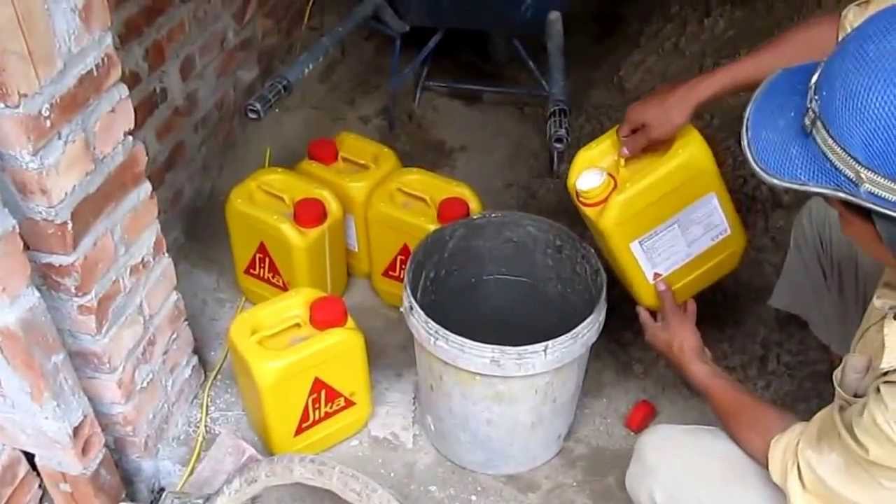 thi công trộn vữa sika Latex
